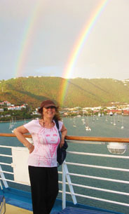 Gail Small and double rainbow in the Caribbean